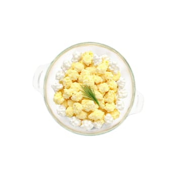 Scrambled eggs fluffy curds in glass bowl chives fluttering down Food and Culinary concept. Food isolated on transparent background.