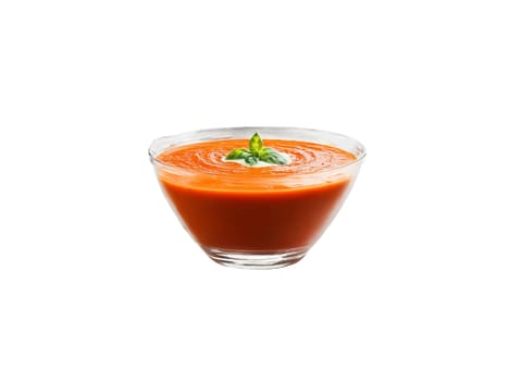 Vegan roasted red pepper and tomato soup with basil cream served in a transparent glass. Food isolated on transparent background.