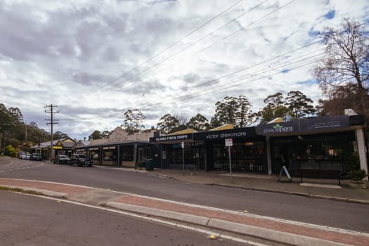 OLINDA, AUSTRALIA - AUGUST 15 2024: The quaint tourist country town of Olinda in the Dandenong Ranges on a quiet winter's afternoon in Victoria, Australia