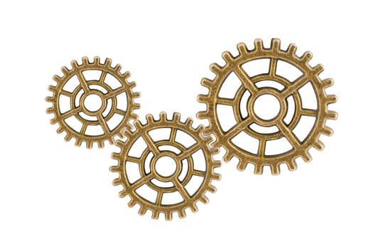 Gear and cogs wheels isolated on a white background, clock mechanism, brass metal engine industrial.