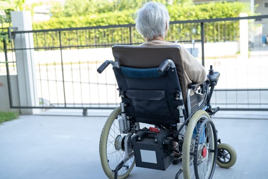 Asian senior woman patient on electric wheelchair, healthy strong medical concept.