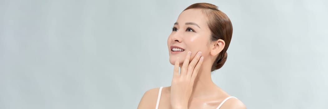 Beauty shot of Beautiful women with clean fresh skin, Asian woman. Web banner