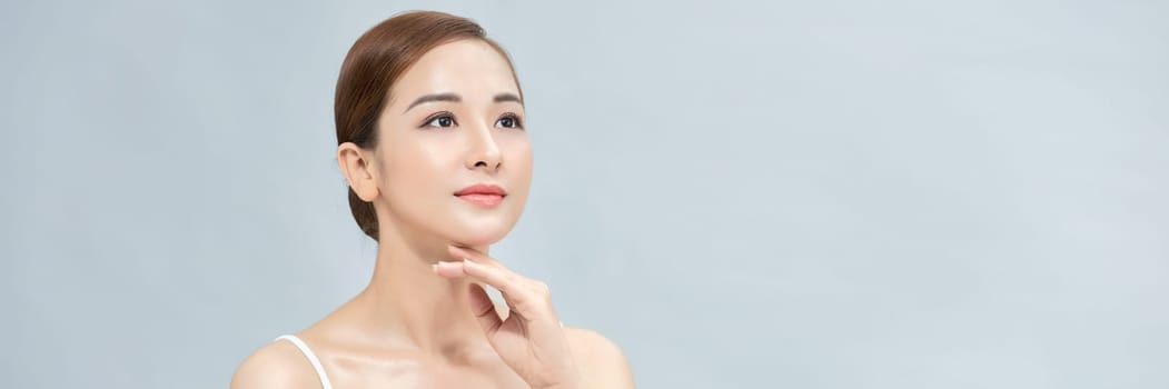 Beauty shot of Beautiful women with clean fresh skin, Asian woman. Web banner