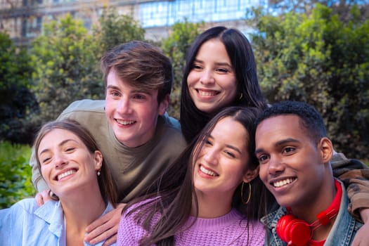 Group of students, meet on university campus work together on creative tasks, prepare for university exams, use laptop. Education, study of university life concept.