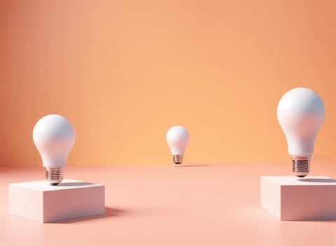 Three light bulbs of different sizes are positioned atop white blocks against a gentle peach-colored background. The arrangement creates an inviting atmosphere, highlighting the unique shapes of the bulbs. Soft lighting enhances the tranquil setting, drawing attention to the objects.