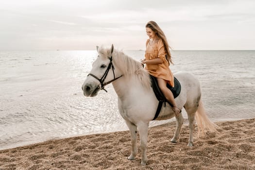 A white horse and a woman in a dress stand on a beach, with the sky and sea creating a picturesque backdrop for the scene