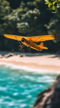 Yellow vintage airplane flying over tropical beach, daytime. Adventure and travel concept.