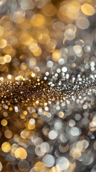 Abstract bokeh lights background, festive glittering gold and silver lights. New year celebration and holiday concept.