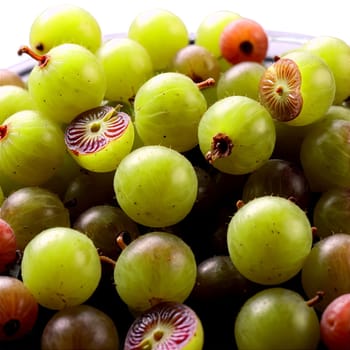 Gooseberries green gooseberries arranged in a triangle shape with some berries cut open and seeds. Food isolated on transparent background.
