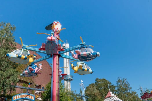 Helsinki, Finland - 19 AUGUST 2024: Linnanmaki amusement park with carousel Helikopteri, empty