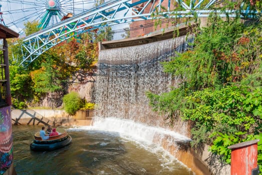 Helsinki, Finland - 19 AUGUST 2024: Water ride Hurjakuru in the amusement park Linnanmaki