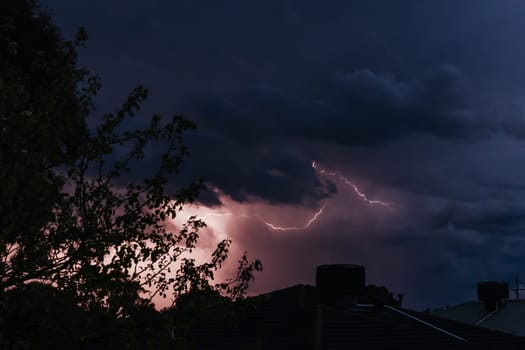 A winter's day storm with thunder and lightning over the estate of Springthorpe in Macleod, Melbourne, Australia