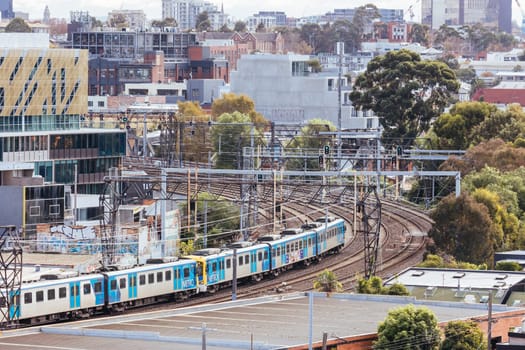 MELBOURNE, AUSTRALIA - JUNE 10, 2022: A view of Melbourne Metro train between Richmond and South Yarra from a high rise building in Cremorne in Australia