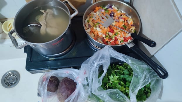 soup and fresh vegetable green red salad, boiled meat, healthy food lunch cooking dinner. High quality photo