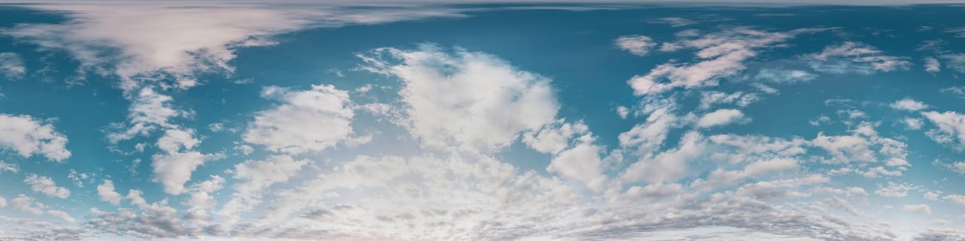 Bright sunset sky panorama with Cirrus clouds. Seamless hdr spherical equirectangular 360 panorama. Sky dome or zenith for 3D visualization, game and sky replacement for aerial drone 360 panoramas.