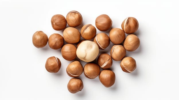 A bunch of macadamia nuts on top of a white table.