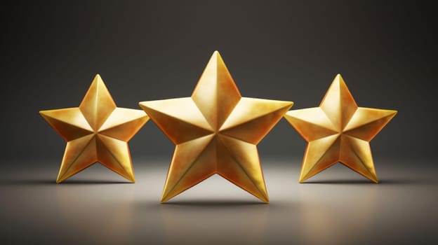 A group of three gold stars sitting next to each other.