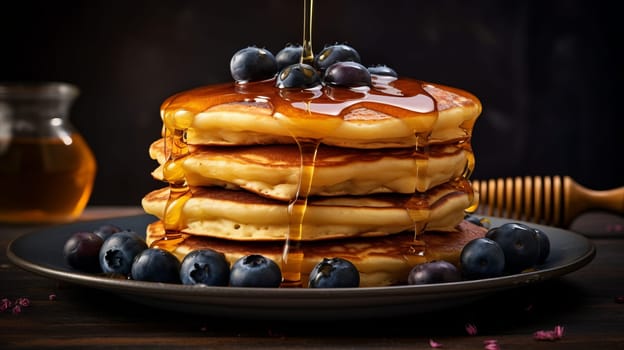 A Delicious Stack of Fluffy Pancakes Topped With Fresh Blueberries and Sweet Syrup.