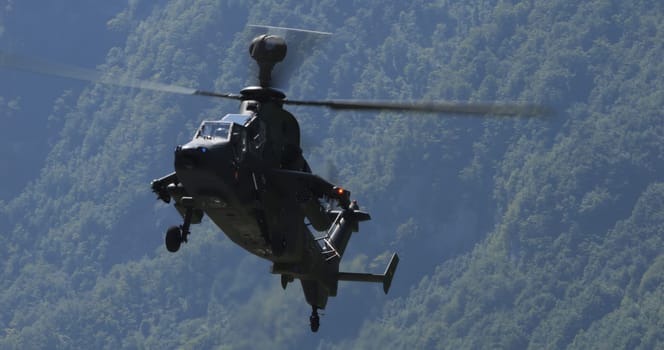 Mollis Switzerland August 18 2023: Eurocopter Tiger helicopter from the German Army in action during a NATO training. Copy space for text or graphics.