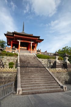 The iconic Kiyomizu-dera temple and mountain view on a sunny spring day in Kyoto, Japan