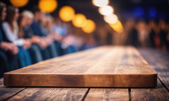 A wooden table, possibly in a restaurant or bar, with a blurry background of people sitting and talking