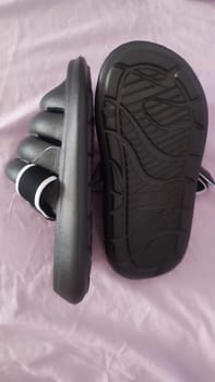 black summer rubber flip flops shoes slippers slates. High quality photo