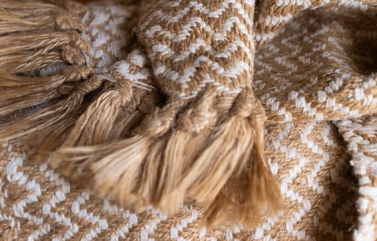 Decorative background of rustic fabric in beige tones . Wallpaper for textile products. Space for copy. High quality horizontal photo