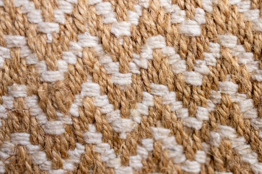 Wallpaper for textile products. Space for copy.Decorative background of rustic fabric in beige tones . High quality horizontal photo.Autumn-colored warm wool blankets.