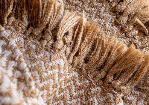 Wallpaper for textile products. Space for copy.Decorative background of rustic fabric in beige tones . High quality horizontal photo