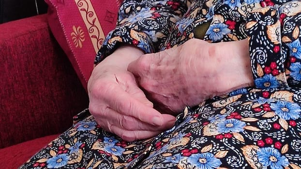 old woman's hands, fingers, person , body leather parts, clothes. High quality photo
