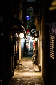 KYOTO, JAPAN - MAY 13, 2019: A Atmoshphere and architecture of Pontocho Alley at night in central Kyoto, Japan