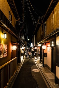 KYOTO, JAPAN - MAY 13, 2019: A Atmoshphere and architecture of Pontocho Alley at night in central Kyoto, Japan
