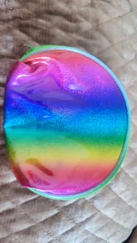multicolored rainbow abstract background, women's wallet, accessories colors. High quality photo