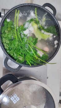 chicken leg in a saucepan for broth, food lunch cooking preparation dinner, products. High quality photo