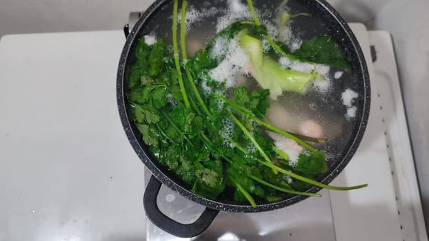 chicken leg in a saucepan for broth, food lunch cooking preparation dinner, products. High quality photo