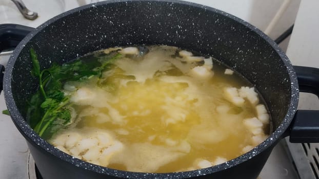 chicken leg in a saucepan for broth, food lunch cooking preparation dinner, products. High quality photo