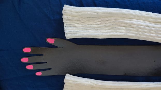 white glove, hand fingers, women's clothing, objects. High quality photo