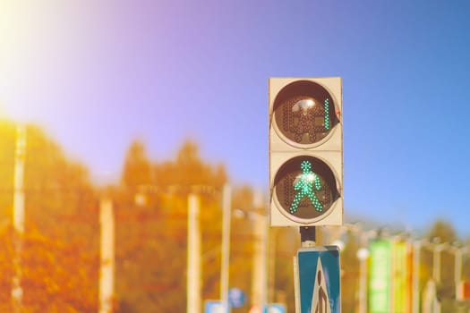 Green traffic light for a pedestrian people with stopwatch. Walk sign with counter