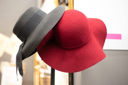Womens straw hat with a ribbon on a white background.