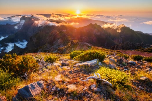 View of mountains over clouds from Pico Ruivo on sunset. Madeira island, Portugal