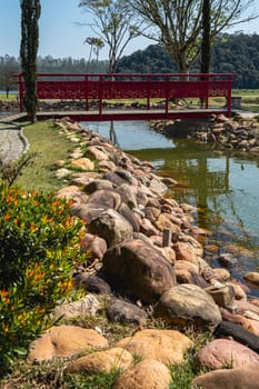 Ribeirão Pires, SP Brazil. August 29, 2024.
Beautiful Bridge and pond in the Oriental  Park. Milton Marinho De Moraes.