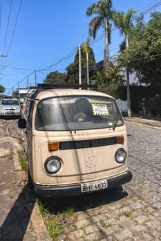 Ribeirao Pires, SP Brazil, Augustus 30, 2024. An old white Volkswagen Transporter bus.  Parked on the side in the streets of Ribeirao Pires , Brazil,