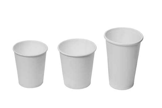 Three white paper disposable cups on a white isolated background.