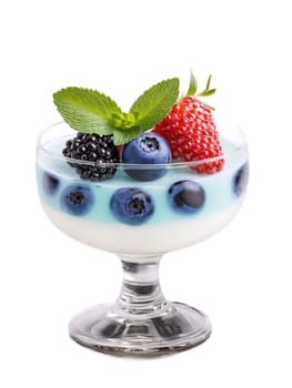 Russian Medovukha in clear glass garnished with few fresh berries and sprig of mint. Drink isolated on transparent background.