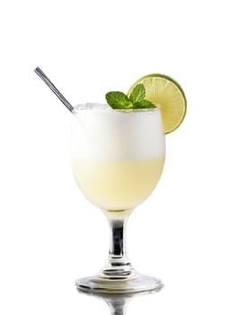 Chilean Pisco Sour with slice of lime and sprig of mint in cocktail glass. Drink isolated on transparent background.