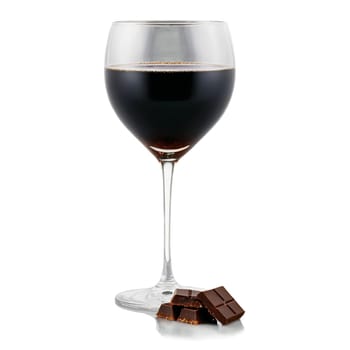 Petite Sirah in a small stemmed glass inky black color served with a square of.