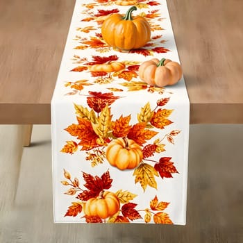 A vibrant table runner adorned with pumpkins and autumn leaves is elegantly draped over a wooden table. The warm colors create a cozy atmosphere for seasonal gatherings.
