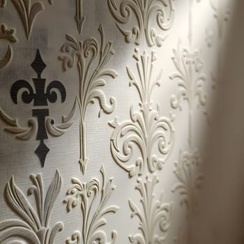 The textured wallpaper showcases ornate floral patterns and a central motif, beautifully illuminated by natural light, creating a warm and inviting atmosphere.