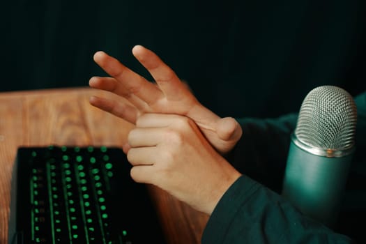 Mad gamer Streamer show gestures. Man shows sings of failure.