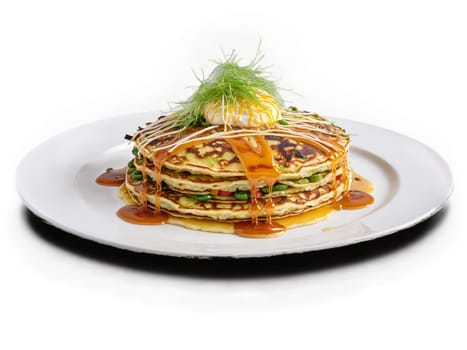 Okonomiyaki with savory pancake vegetables and sauce on clean white plate. Food isolated on transparent background.